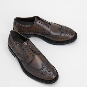 Tod’s leather wing tip derby shoes brown rubber sole